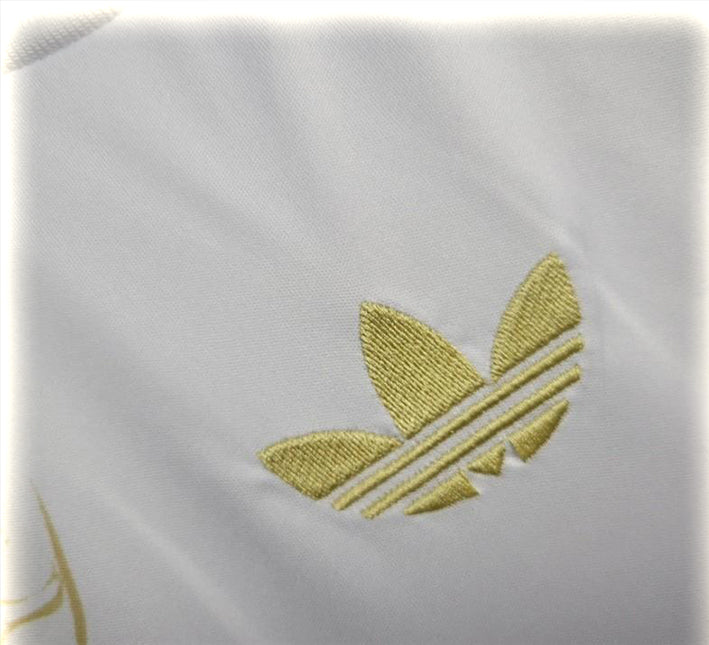Tunica Real Madrid design drago oro per tifoso del club versione collector 2425