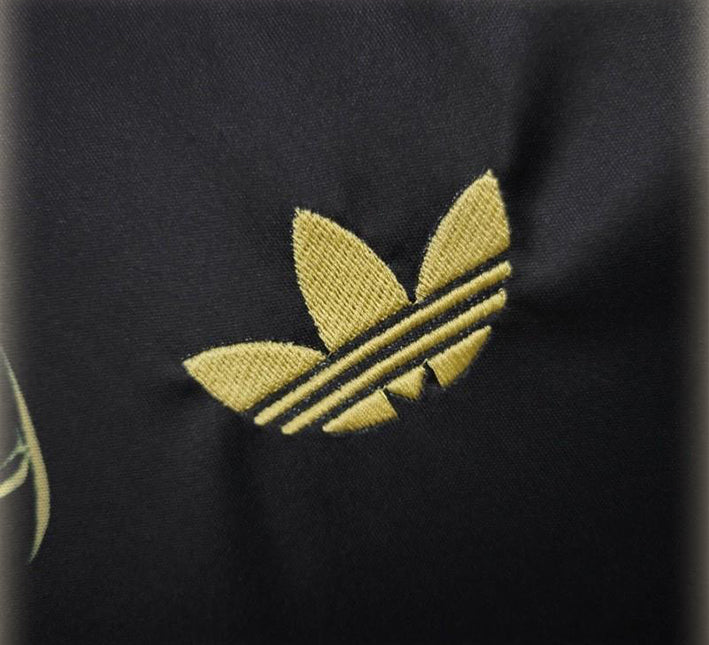 maillot-concept-real-madrid-motif-dragon-dore-edition-2425 Maglia concept Real Madrid motivo drago dorato edizione 2425
