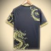 jersey-supporter-real-madrid-style-concept-avec-dragon-dore Maglia supporter Real Madrid stile concept con drago dorato