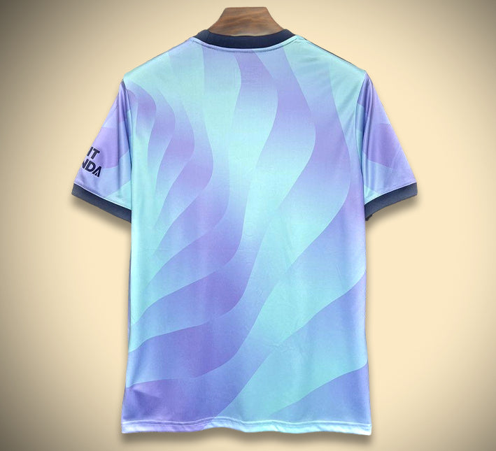 maglia alternativa rossa e bianca Arsenal 2425