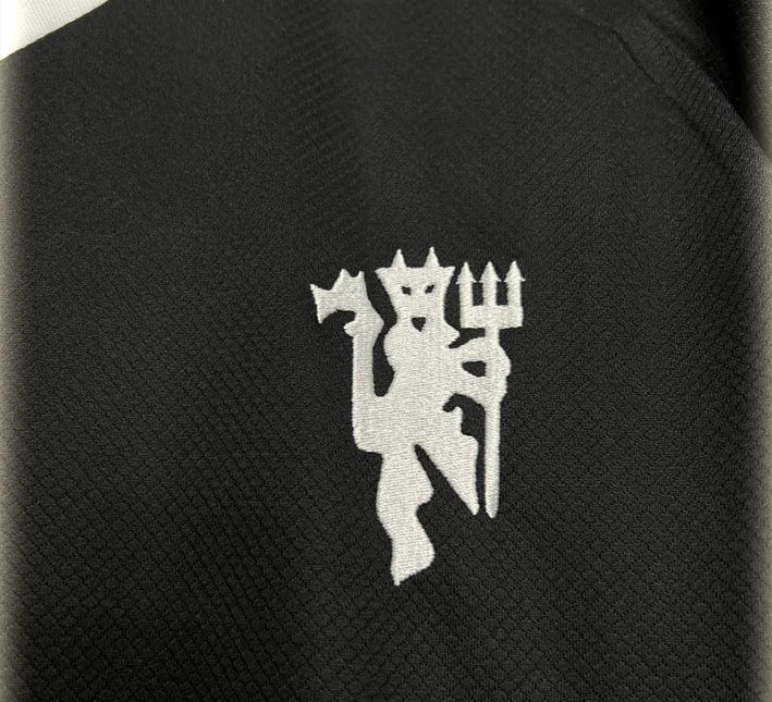 tenue-de-gardien-de-but-manchester-united-noir-manches-longues Tenuta da portiere Manchester United nera maniche lunghe