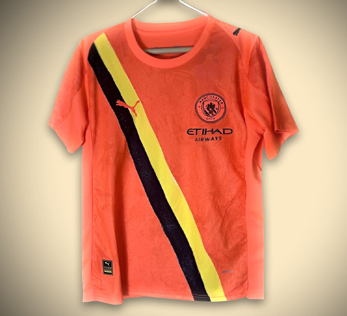 maillot-manchester-city-third-orange-2526 Maglia Manchester City Third Arancione 2526