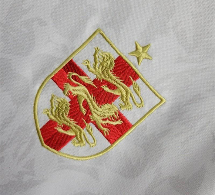 maillotangleterrecommablanclogo.jpg Maglia Concept Inghilterra Edizione Comma Bianco 2024 vista laterale