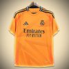 maillotrealmadridexterieurorange-1.jpg Maglia Real Madrid Away 2024-2025 vista frontale