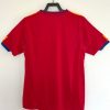 maillot-domicile-espagne-2010-coupe-du-monde-adidas-rouge-et-bleu Maglia home Spagna 2010 Mondiale Adidas rosso e blu