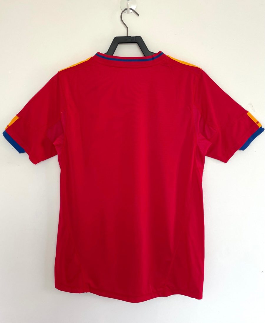 maillot-domicile-espagne-2010-coupe-du-monde-adidas-rouge-et-bleu Maglia home Spagna 2010 Mondiale Adidas rosso e blu