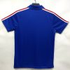 maglia retro blu dei Bleus calcio con stemma Francia
