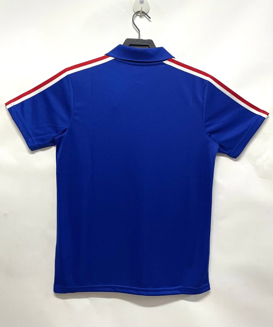 maglia retro blu dei Bleus calcio con stemma Francia