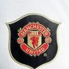 Divisa da calcio Manchester United rossa modello esterno vintage