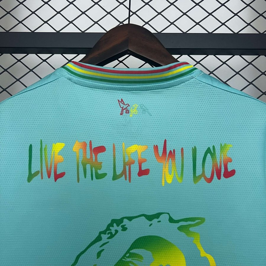 tshirt-football-ajax-amsterdam-hommage-bob-marley-tenue-domicile-2025-2026 Maglietta calcio Ajax Amsterdam omaggio Bob Marley tenuta Home 2025 2026