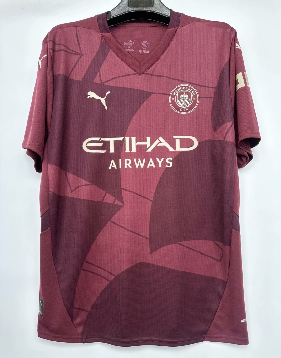 69259215-ab55-4c92-a121-53ca99bdc8ea_1433afcd-d254-4b4e-90ed-c6dcc3edfc8e.jpg Maglia Manchester City 24/25 Rossa