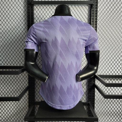 6c0a26dc07f7810f4c6841c76147b2fe5_540x_e42514cd-707d-4c43-b8fa-03598461b078.jpg Maglia Real Madrid Away 2022-2023 Viola