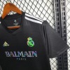 7FBB41CC1B27FB57A1EF7D4B8C7B6D2F_540x_f17aed9f-47b7-4596-a39c-a25c190fce10.jpg Maglia Real Madrid 2023-2024 Nero Balmain