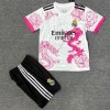 f7cd7460894322ed4daae366cd613aeb.jpg Maglia Real Madrid 25/26 Bambino Rosa Drago